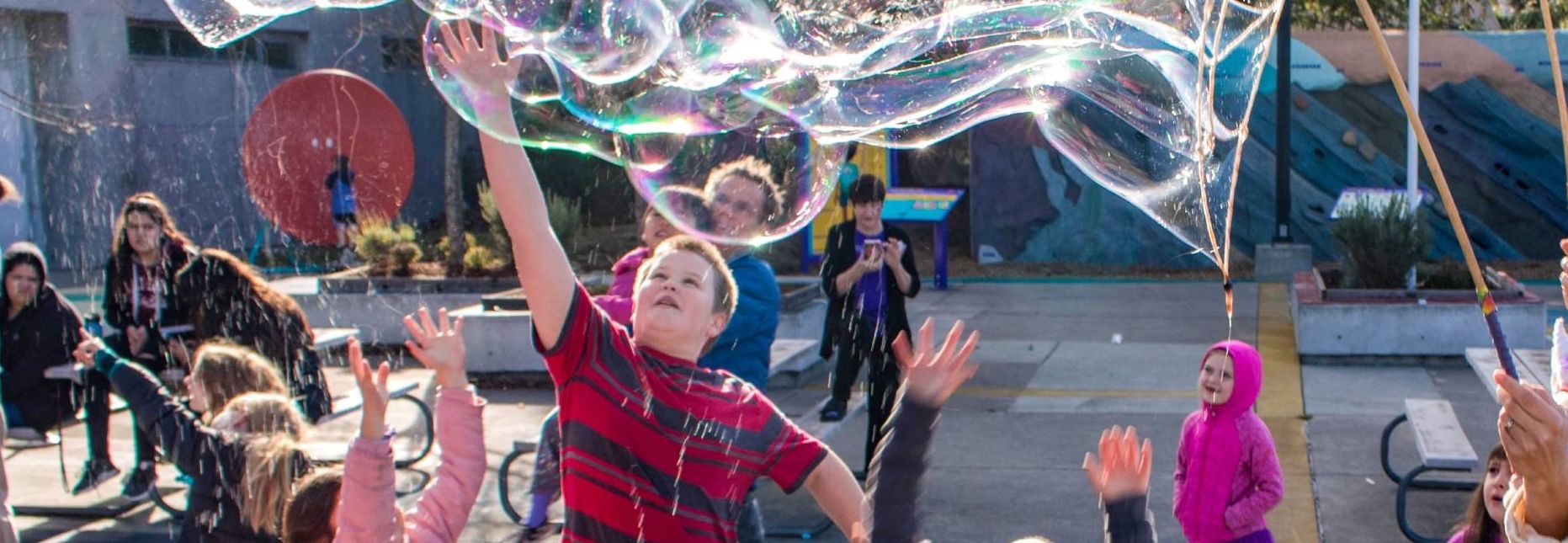 SW Event Children chasing bubbles