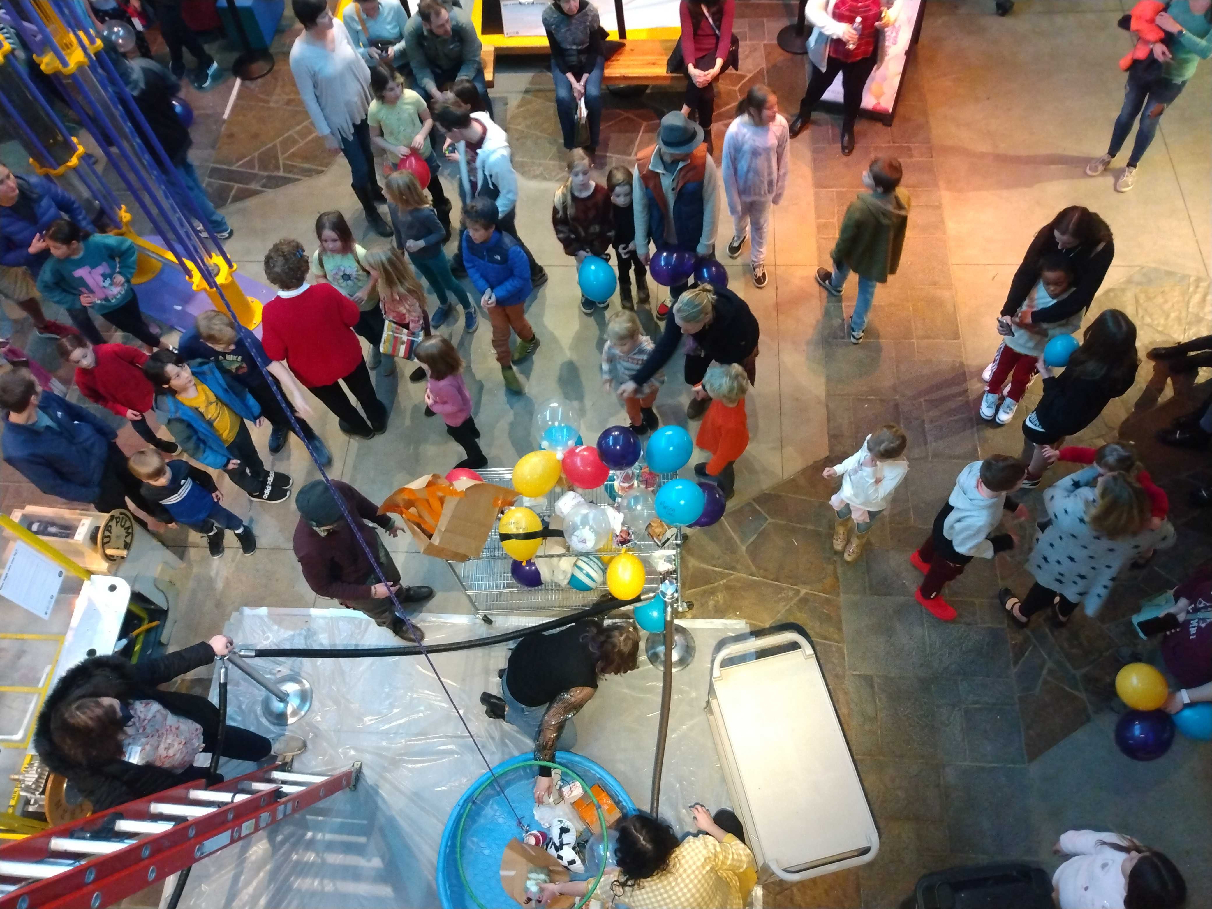 A view from high up in Kranzler hall, looking down on guests waiting for the Egg Drop Challenge to begin